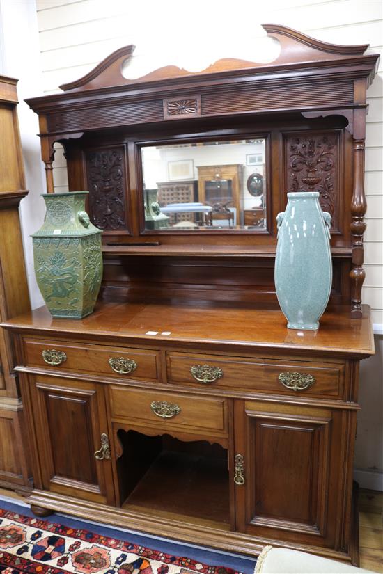 A late Victorian mahogany sideboard, with mirrored, shelved superstructure W.152cm